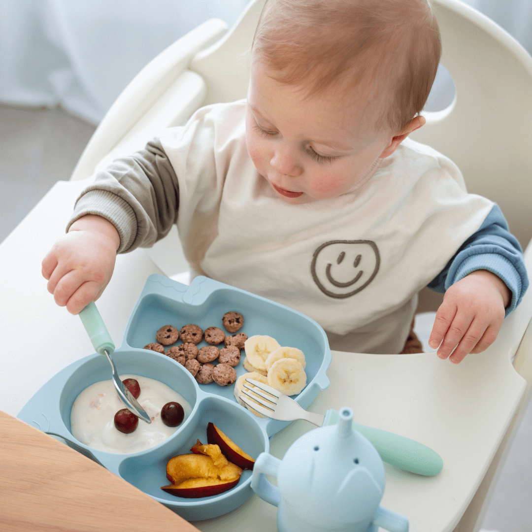 Olifanten vakjes bord in sfeer met kindje.